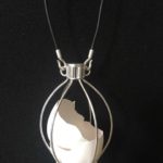 Judy_Wukitsch_Manifest, Our State of Being- Protecting_sterling silver, mixed media_4.5_x3.5_ caged piece